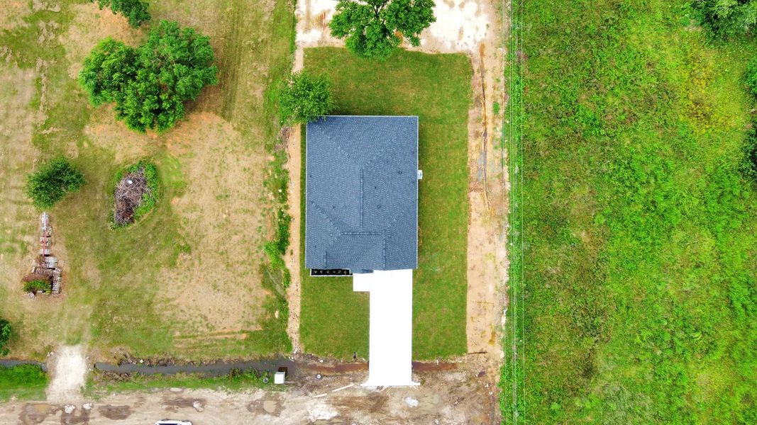 Front exterior of a new home in , Waller, TX, highlighting curb appeal (Image 23).