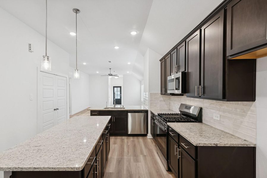 Furnished interior view inside a new home in Pinewood at Grand Texas, New Caney (Image 6). Furnished interior view inside a new home in Pinewood at Grand Texas, New Caney (Image 6).