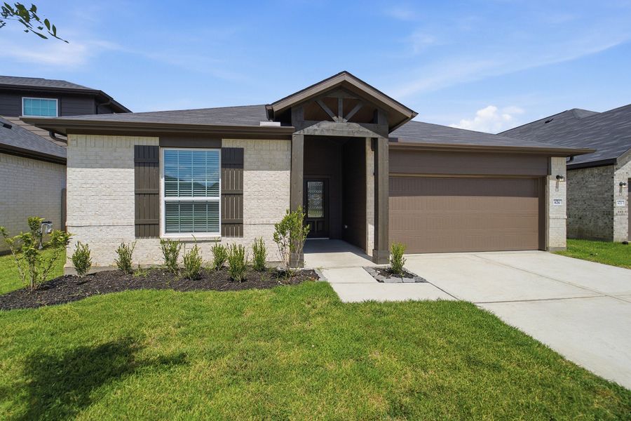 Front exterior of a new home in Pecan Estates, Crosby, TX, highlighting curb appeal (Image 23).