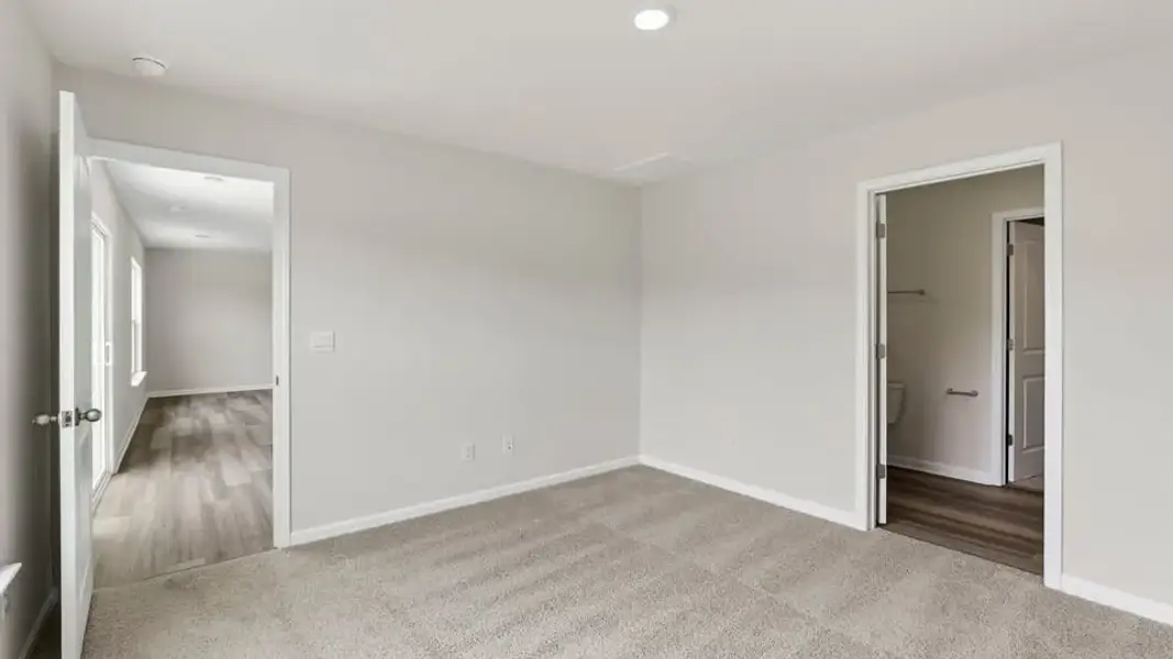 Spacious, unfurnished interior of a new home in Waverly Station, Greenwood (Image 33).
