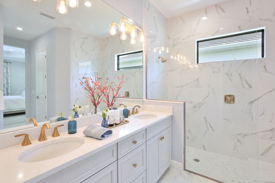 Furnished interior view inside a new home in Boca Royale Golf & Country Club at Wellen Park, Englewood (Image 19).