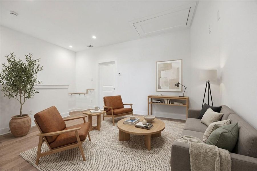 Upstairs Bonus Room Has Been Virtually Staged As A Den.