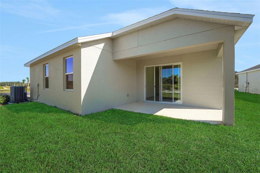 Exterior details and patio area of a home in Willowbrook North, Winter Haven (Image 17).