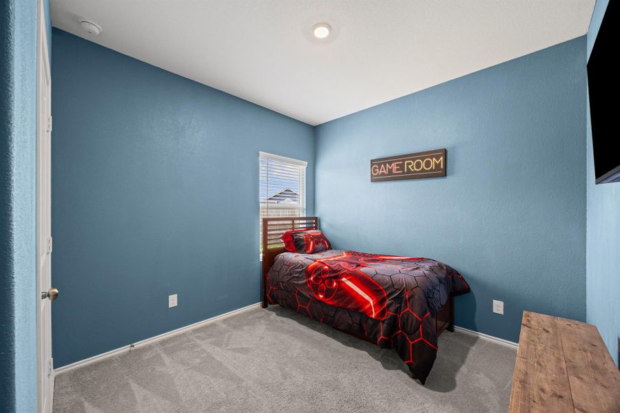 Carpeted bedroom 3 with baseboards Carpeted bedroom 3 with baseboards