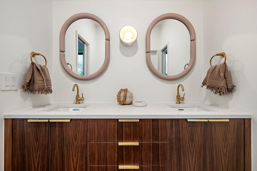 Bathroom with custom walnut cabinetry