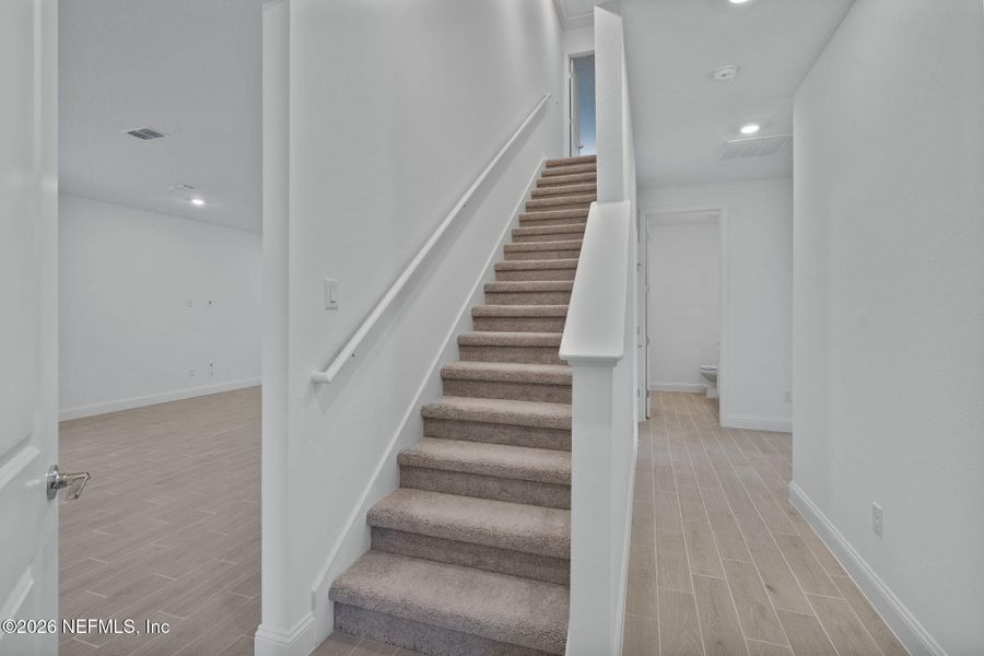 Spacious, unfurnished interior of a new home in Tributary, Yulee (Image 31). Spacious, unfurnished interior of a new home in Tributary, Yulee (Image 31).