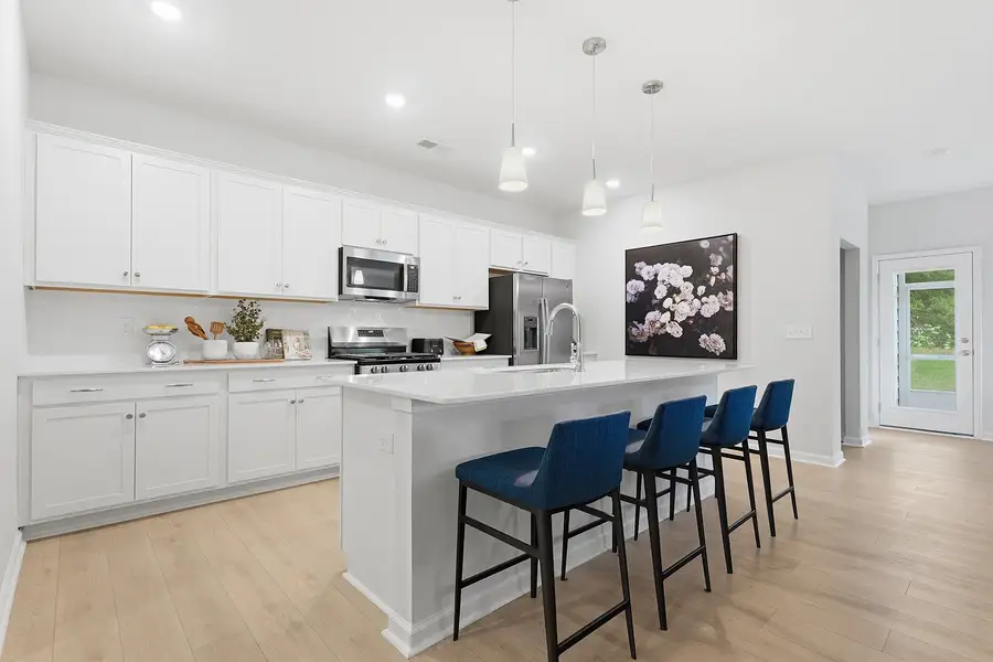 Representative furnished interior of a home built from the Gwinnett II - Genesis Value Collection by Mungo Homes in Hainer Place, Conway (Image 5).