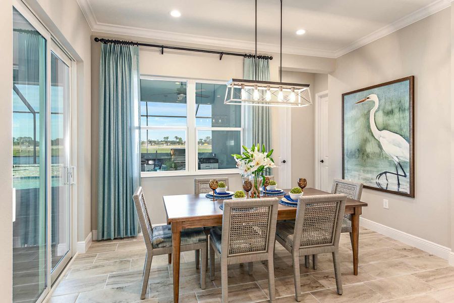 Representative furnished interior of a home built from the Kiawah 2 by Neal Communities in SkySail, Naples (Image 15).