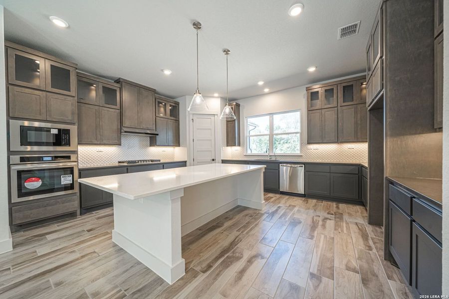 Furnished interior view inside a new home in Pradera Ridge, Floresville (Image 3).