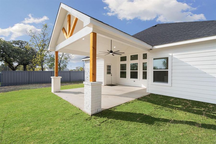 View of patio with a ceiling fan