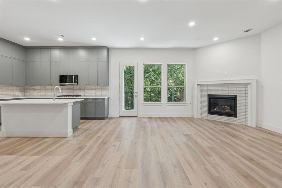 Kitchen and living room views.