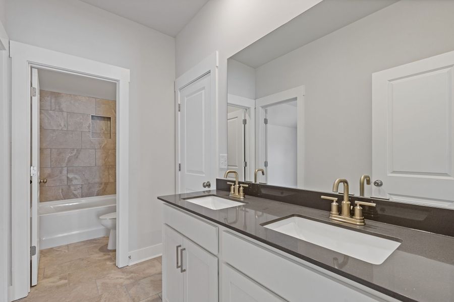 Representative furnished interior of a home built from the Stafford by Crawford Creek Communities in Red Bird Manor, Jefferson (Image 13).
