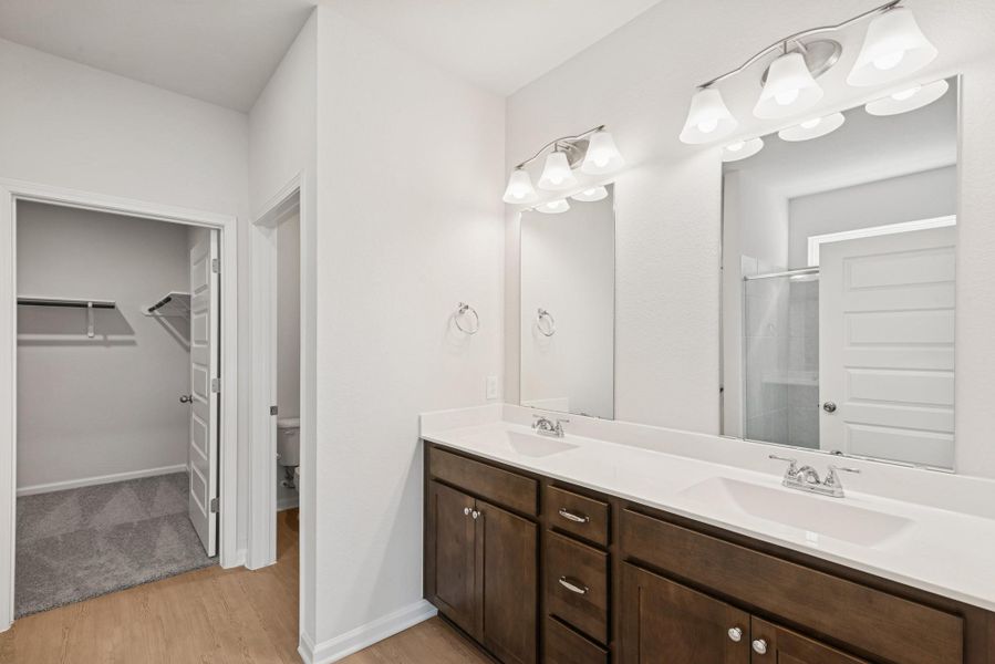 The Georgetown II- Primary Bath with Dual Vanities. Home under construction, photo used for illustrative purposes only, colors and options will vary.