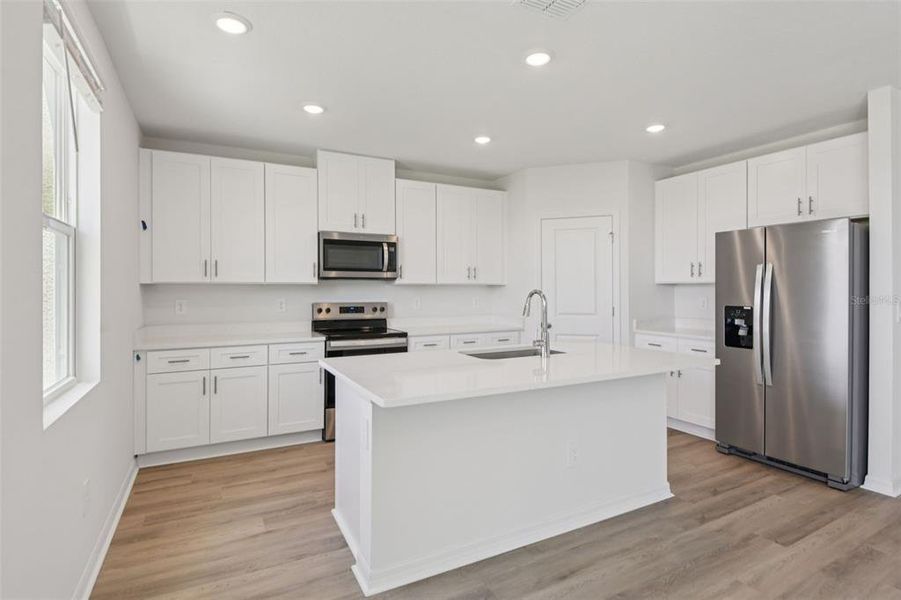 Furnished interior view inside a new home in Hilltop Vistas, Dade City (Image 7).