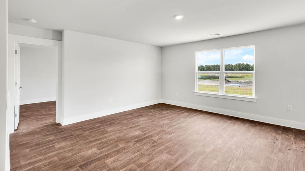 Spacious, unfurnished interior of a new home in Sidbury Station, Castle Hayne (Image 19).