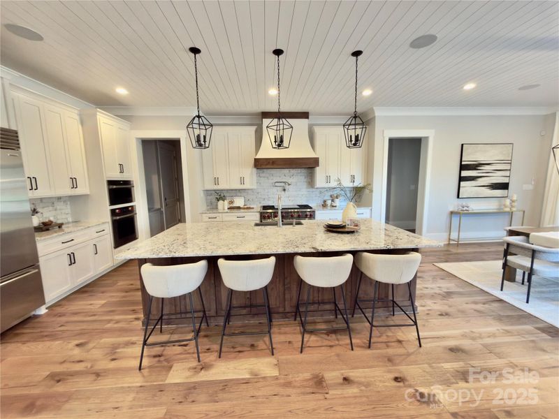 Furnished interior view inside a new home in , Weddington (Image 6).