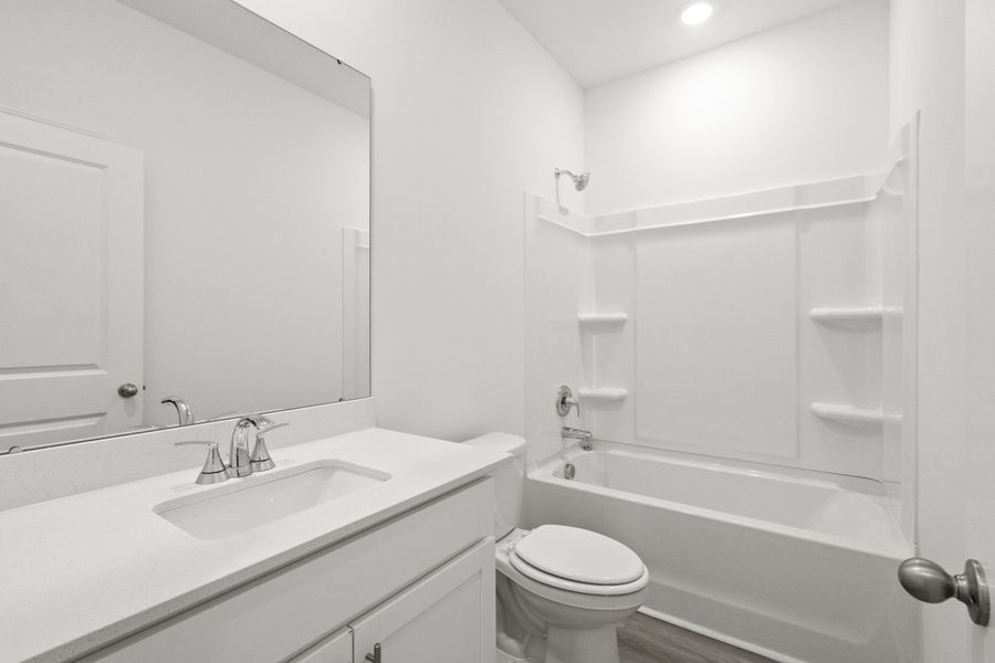 Furnished interior view inside a new home in Cypress Ridge - The Boardwalk Series, Longs (Image 11).