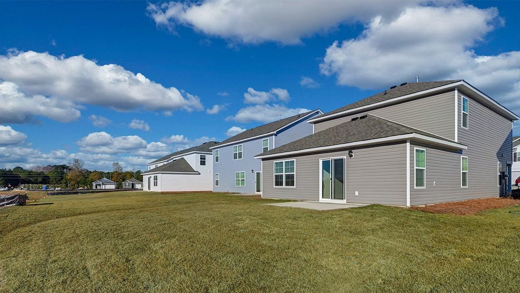 Exterior details and patio area of a home in Hunter's Branch, Hopkins (Image 22).