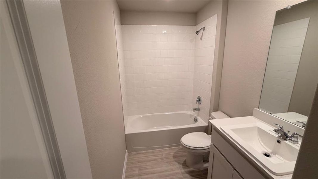 Furnished interior view inside a new home in Rosewood at Beltmill, Fort Worth (Image 5).