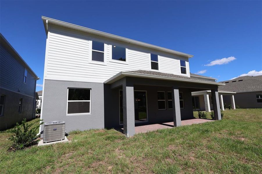 Exterior details and patio area of a home in Eden at Crossprairie, St. Cloud (Image 4).