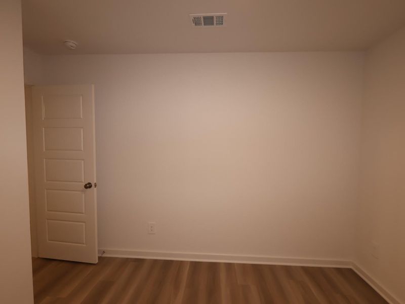 Spacious, unfurnished interior of a new home in Pinewood at Grand Texas, New Caney (Image 21).