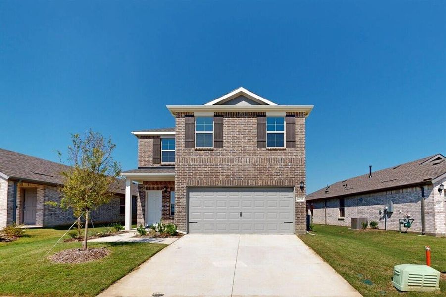 Front exterior of a new home in Mobberly Farms, Pilot Point, TX, highlighting curb appeal (Image 20).
