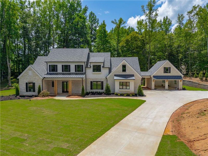 Front exterior of a new home in , Canton, GA, highlighting curb appeal (Image 14).