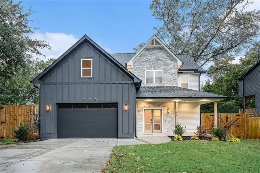 Front exterior of a new home in , Marietta, GA, highlighting curb appeal (Image 1). Front exterior of a new home in , Marietta, GA, highlighting curb appeal (Image 1).