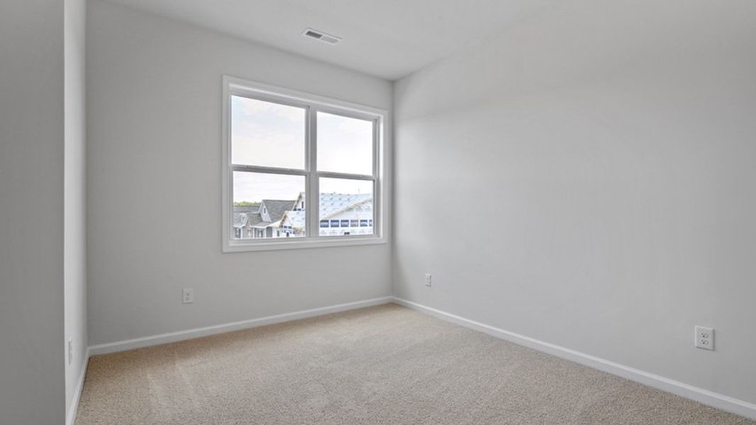 Representative unfurnished interior of a home built from the Lucas by D.R. Horton in The Manors at Haywood Glen, Knightdale (Image 30).