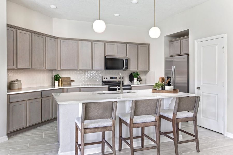 Furnished interior in a model home at Hilliard Ridge in Kissimmee (Image 8).