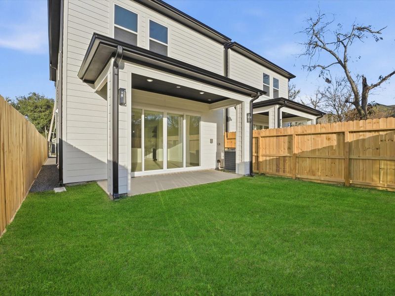 Exterior details and patio area of a home in , Houston (Image 3).