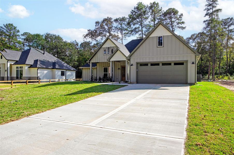 Front exterior of a new home in , Plantersville, TX, highlighting curb appeal (Image 1). Front exterior of a new home in , Plantersville, TX, highlighting curb appeal (Image 1).
