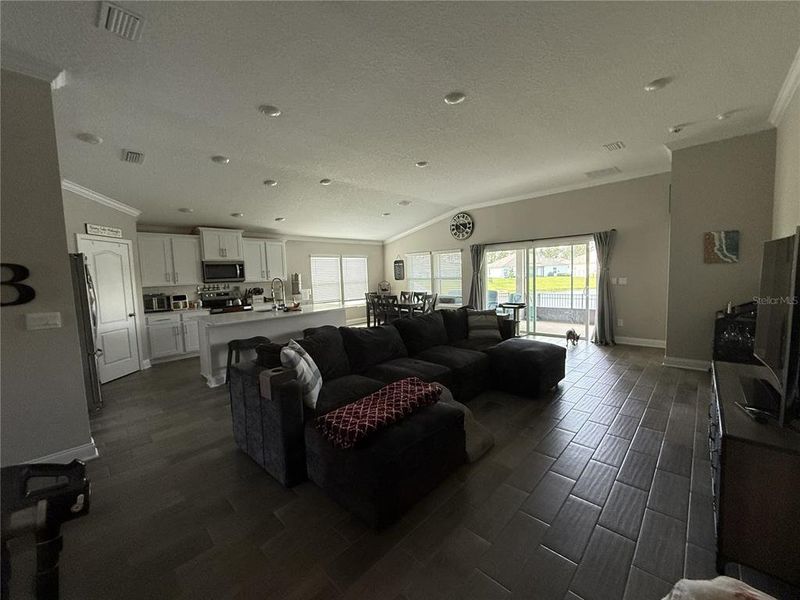 Furnished interior view inside a new home in Sawmill Branch, Palm Coast (Image 4).