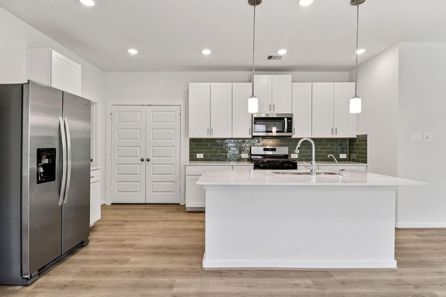 Photo is not of the actual home, but is an inspirational photo of builder’s model home and may depict options, furnishings, and/or decorator features that are not included Photo is not of the actual home, but is an inspirational photo of builder’s model home and may depict options, furnishings, and/or decorator features that are not included