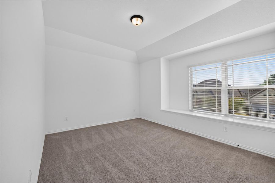 5th Bed Plush carpeting and a deep window seat define this light-filled room. 5th Bed Plush carpeting and a deep window seat define this light-filled room.