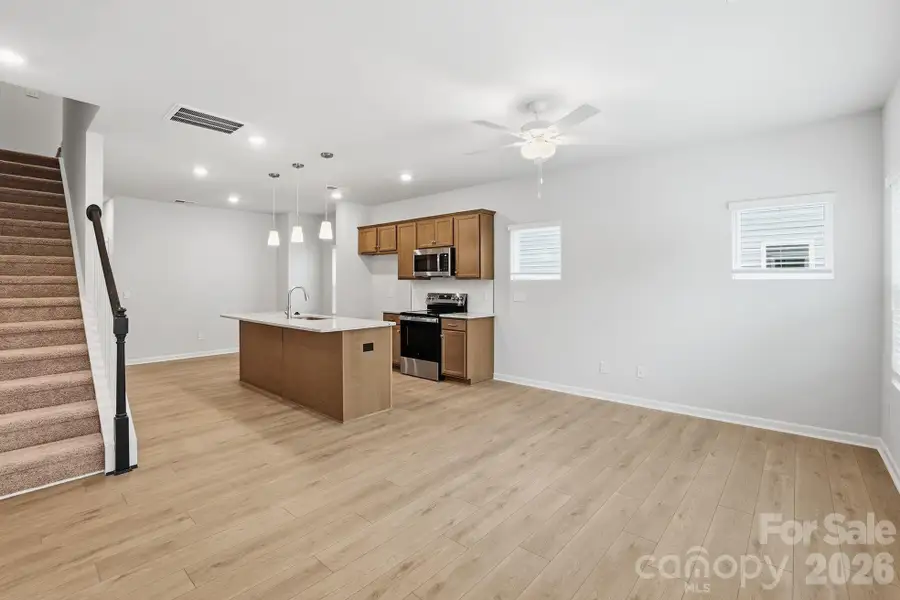Furnished interior view inside a new home in Sloan Station, Charlotte (Image 5).