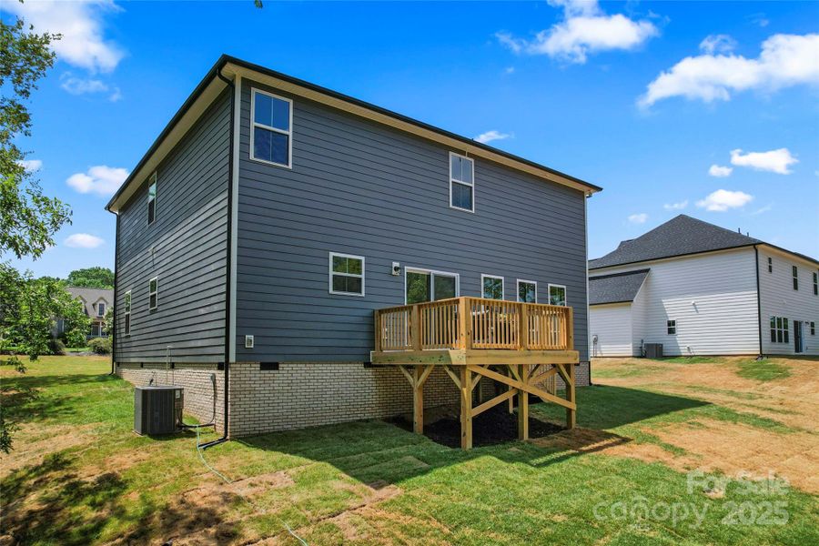 Front exterior of a new home in , Harrisburg, NC, highlighting curb appeal (Image 1).