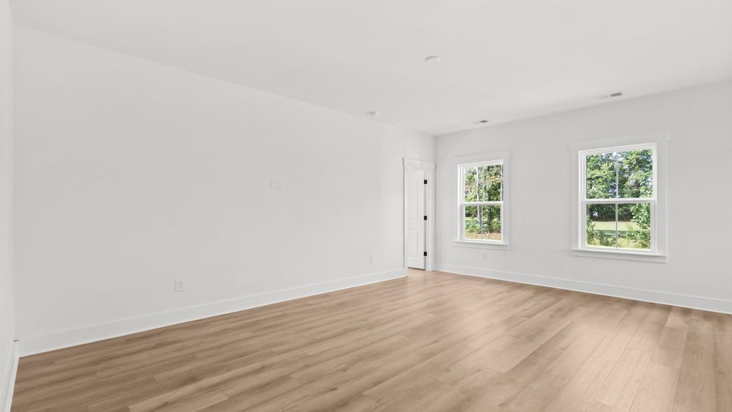 Furnished interior view inside a new home in Bluffs at Sun Colony, Longs (Image 11).