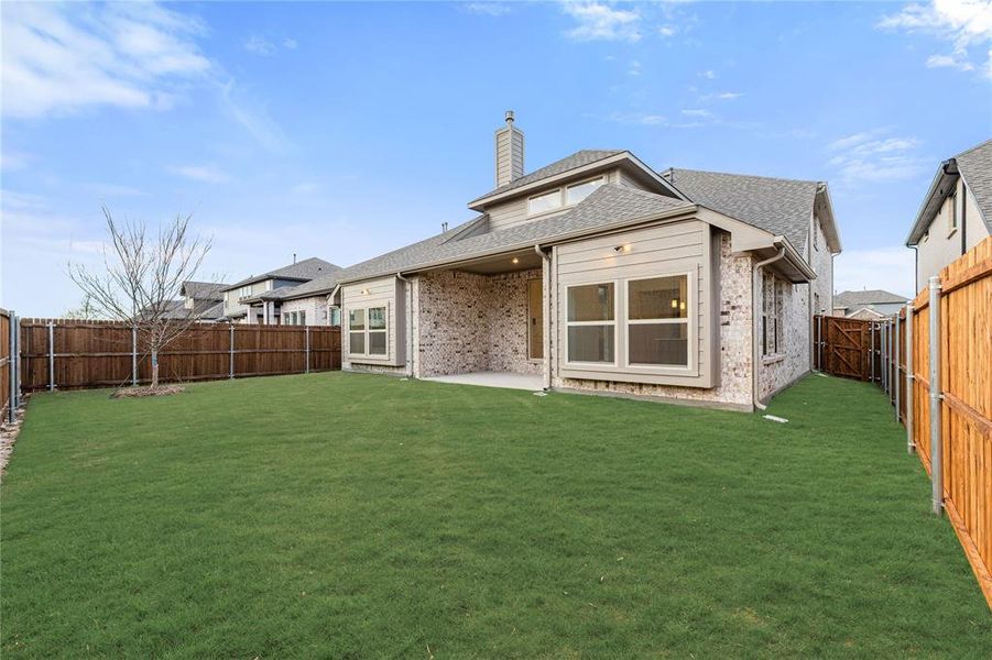 Exterior details and patio area of a home in Willow Wood, McKinney (Image 24).