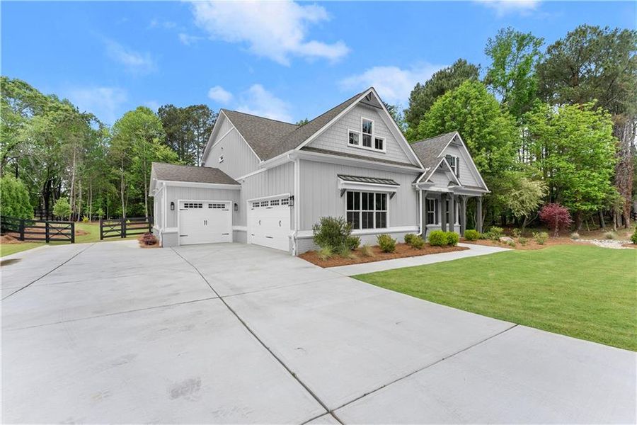 Front exterior of a new home in , Gainesville, GA, highlighting curb appeal (Image 31).