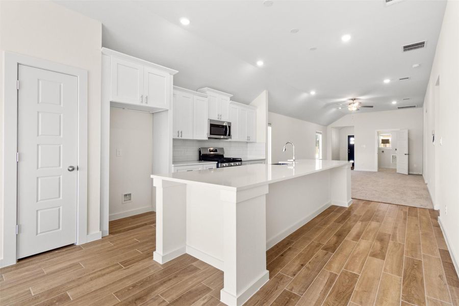 Enjoy chef's kitchen island perfect for family and cooking