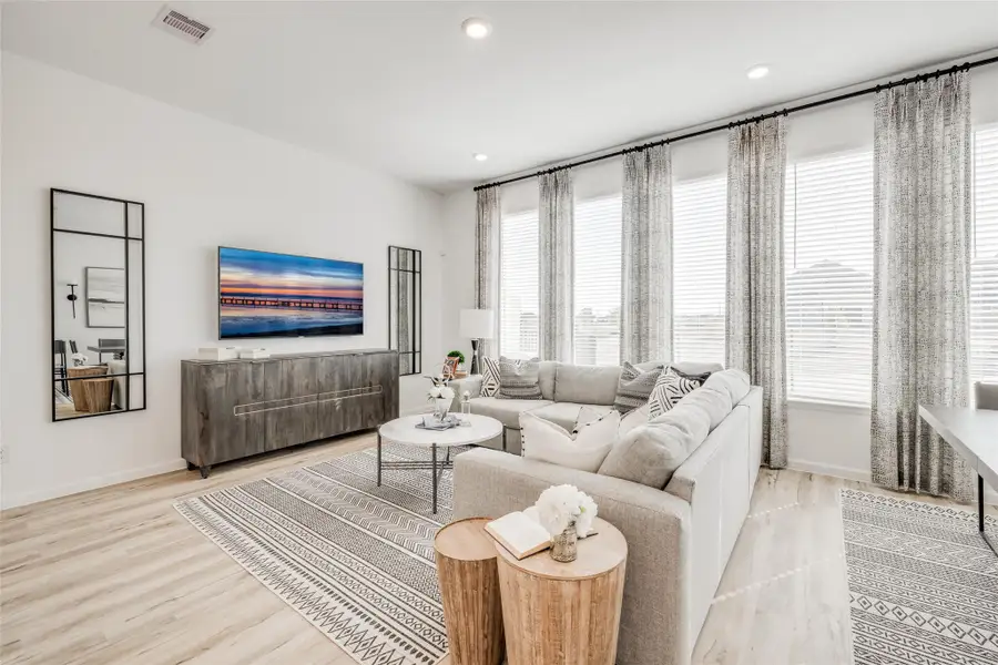 Furnished interior view inside a new home in Bridgeland, Cypress (Image 13).
