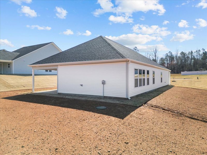 Representative exterior photo of a completed home built from the Cheshire by Enchanted Homes in Mills Gin, Campobello, SC (Image 18).