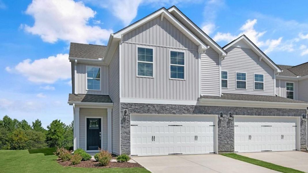 Front exterior of a new home in Lybrook Village, Advance, NC, highlighting curb appeal (Image 1). Front exterior of a new home in Lybrook Village, Advance, NC, highlighting curb appeal (Image 1).