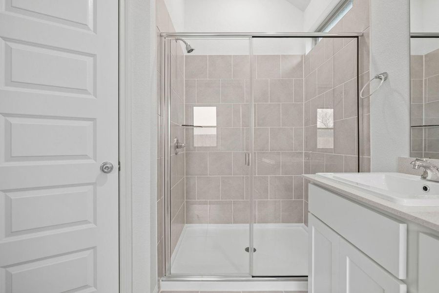 Primary Bath in the Birch home plan by Trophy Signature Homes – REPRESENTATIVE PHOTO