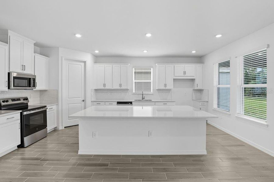Furnished interior view inside a new home in The Cove at West Port, Port Charlotte (Image 9). Furnished interior view inside a new home in The Cove at West Port, Port Charlotte (Image 9).