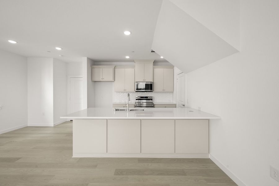 Furnished interior view inside a new home in Wildridge, Oak Point (Image 8).