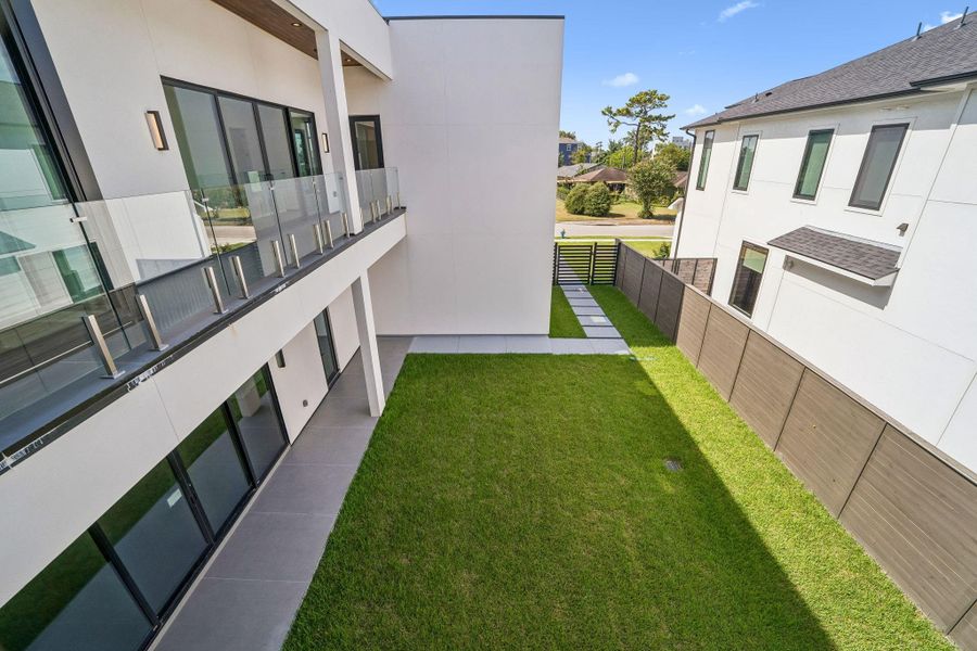 Exterior details and patio area of a home in , Houston (Image 27).