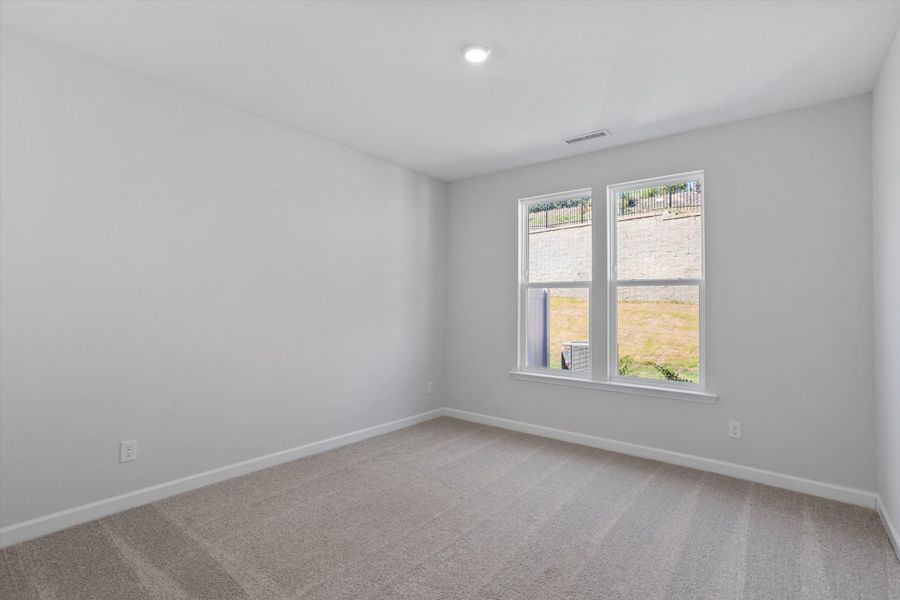 Spacious, unfurnished interior of a new home in Ovation at Sweetbrier, Durham (Image 20).