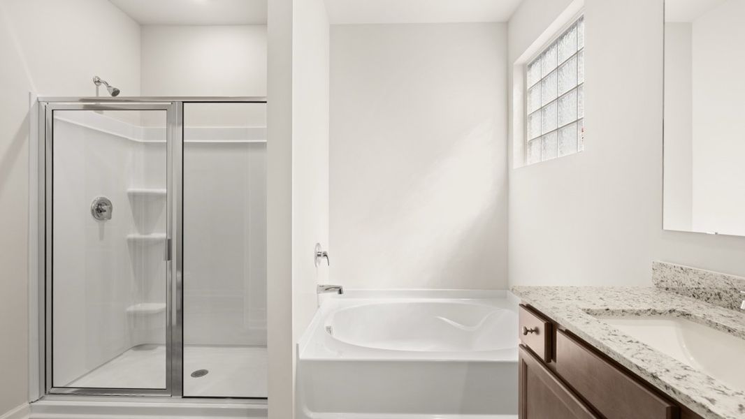 Representative furnished interior of a home built from the Cali by D.R. Horton in South Wind, South Fulton (Image 12).